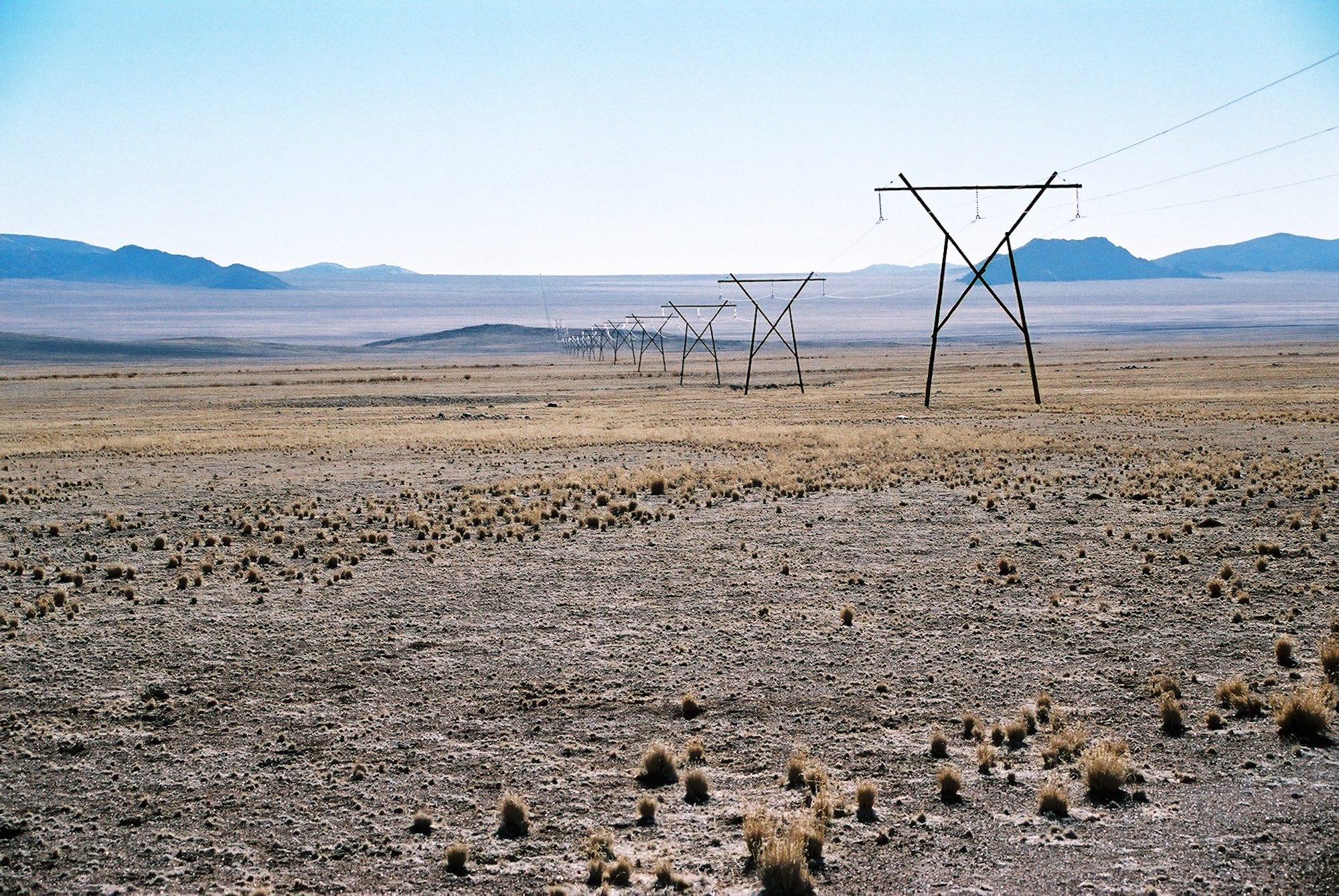Powerlines crossing the desert.
