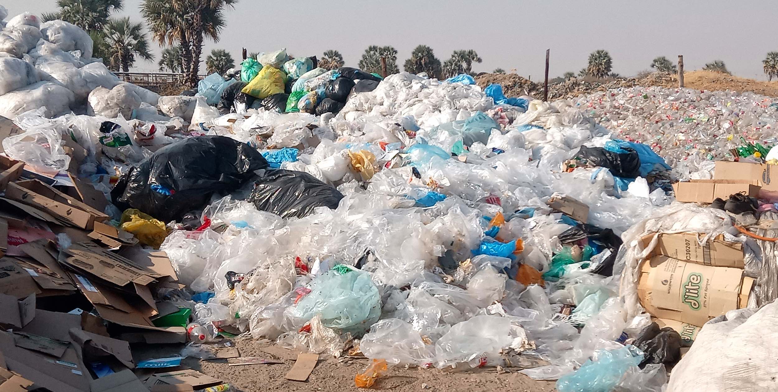 A huge mountain of plastic fills this local tip