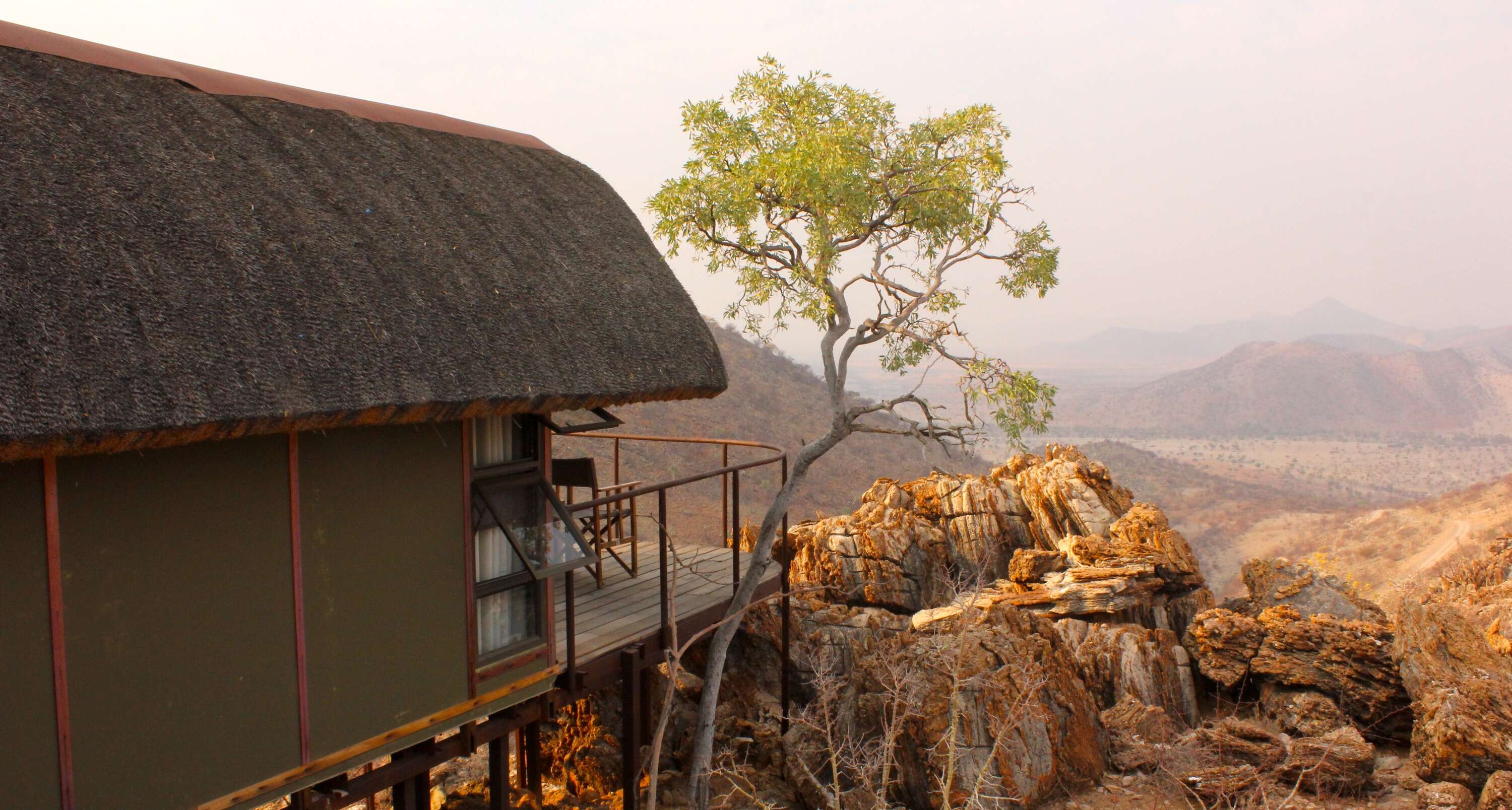 The view from a lodge cabin looking across a spectacular valley.