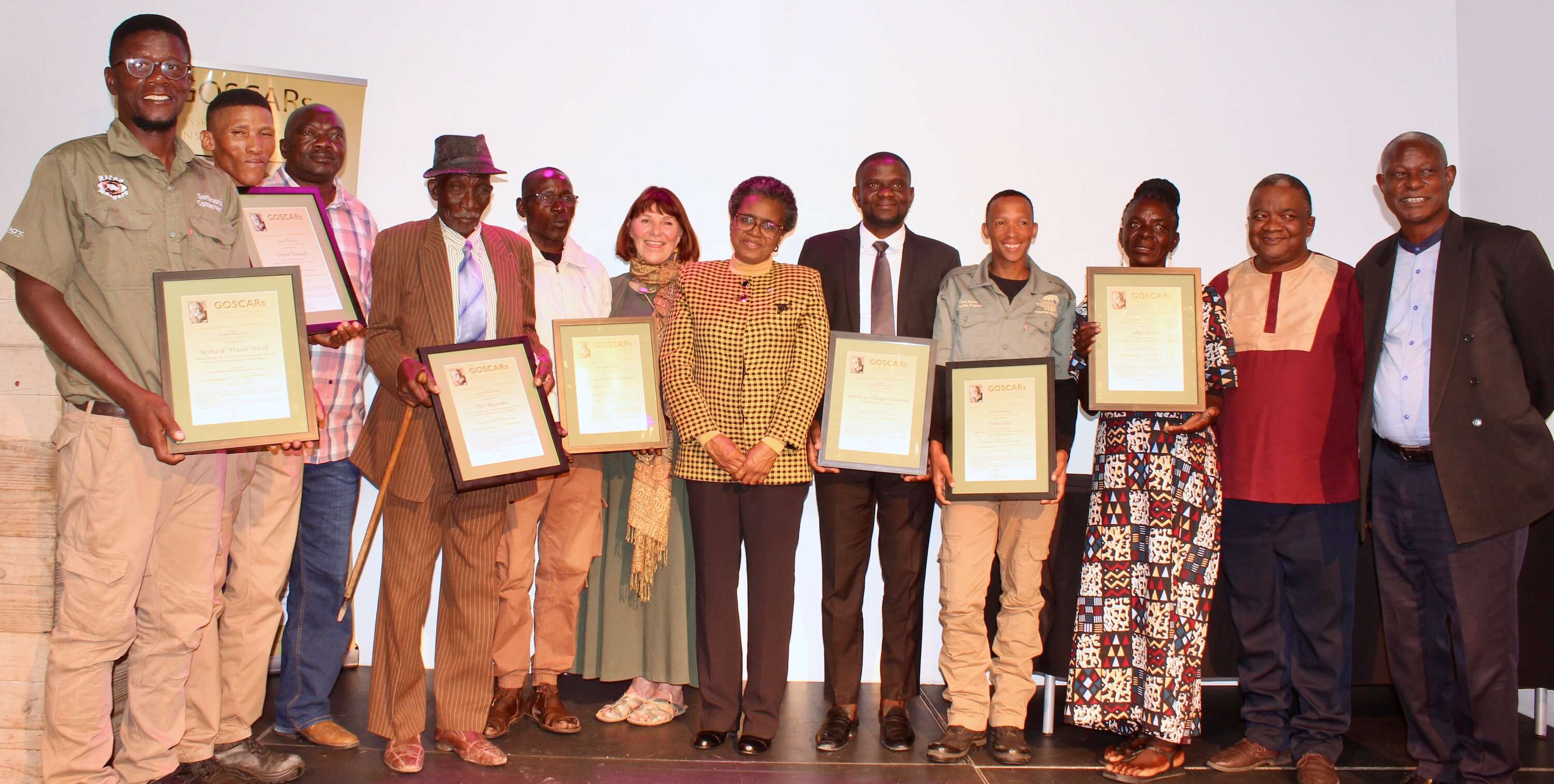 The GOSCAR winners pose for a photo with Margaret Jacobsohn and the Hon. Indileni Daniel.