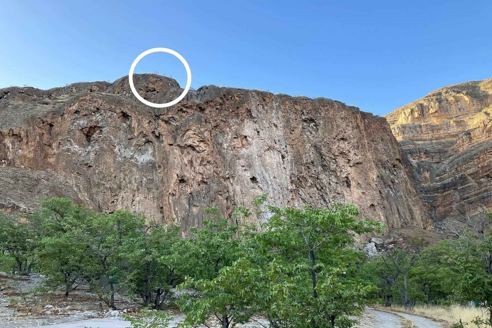 Mountain with the location of the previous photo circled, on the top.