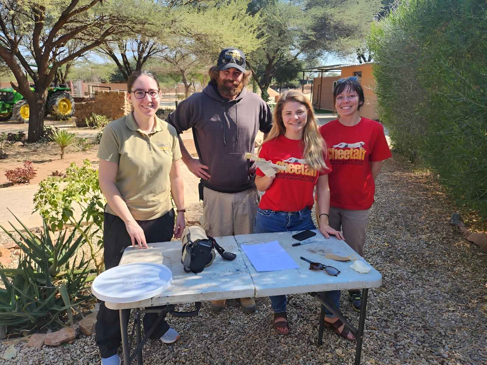 The team smile for the camera.