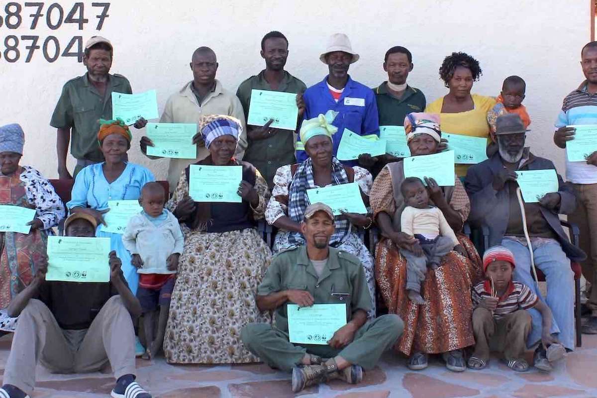 A group of conservancy members outside their office.