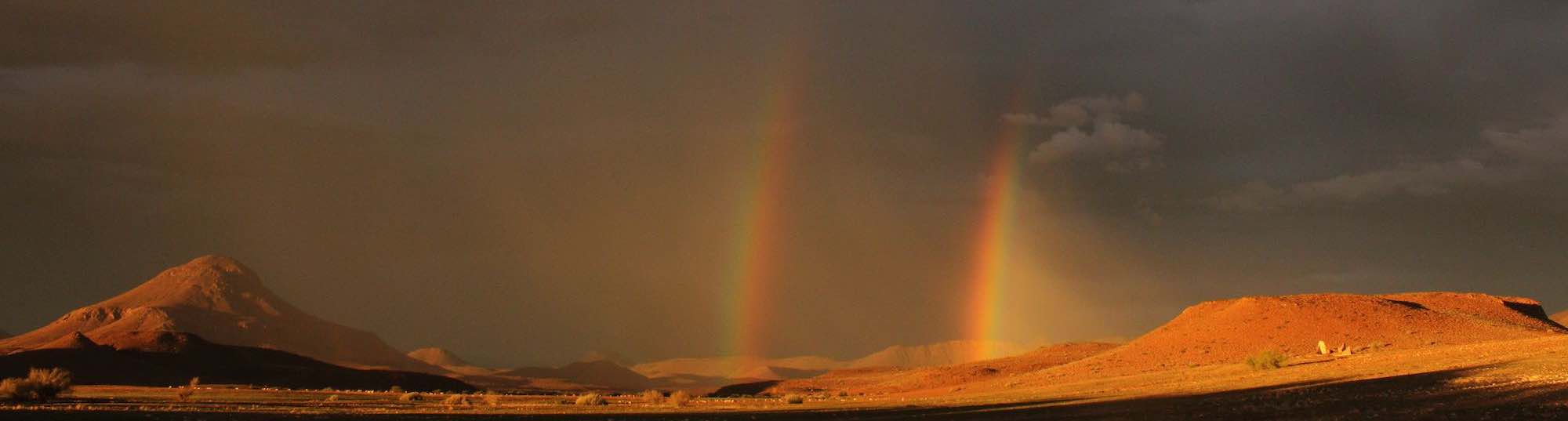 Rainbows over the old farm of Wereldsend.