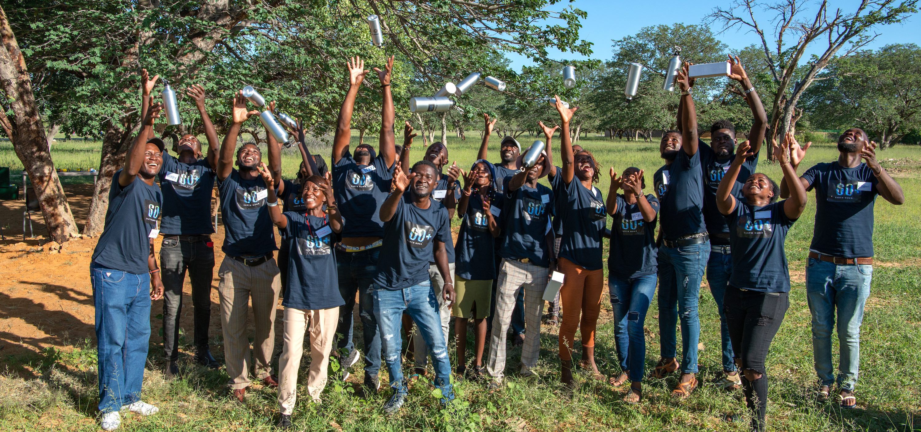 A group of very happy youths jumping for joy.