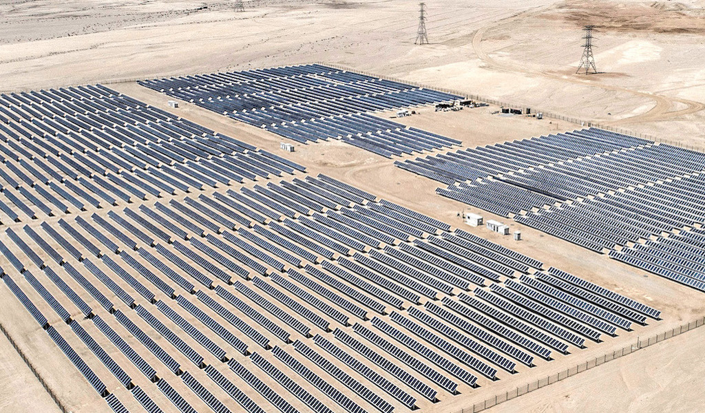 A vast solar farm in the desert.